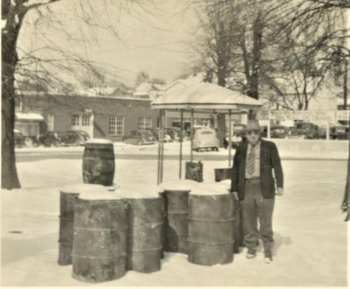 Hugh Kirkpatrick with Still in Front of Artesian Well